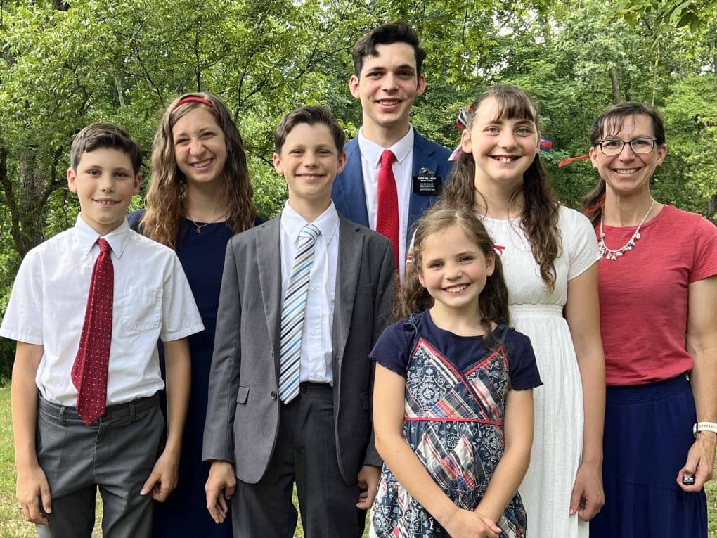 mom and 6 children dressed up for Fourth of July