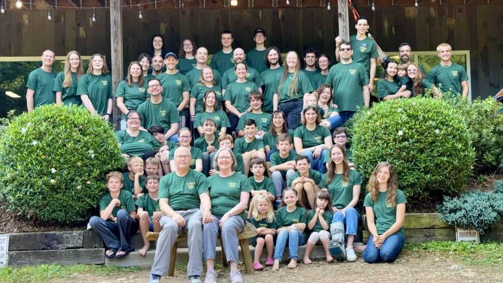 extended family at a reunion in matching shirts