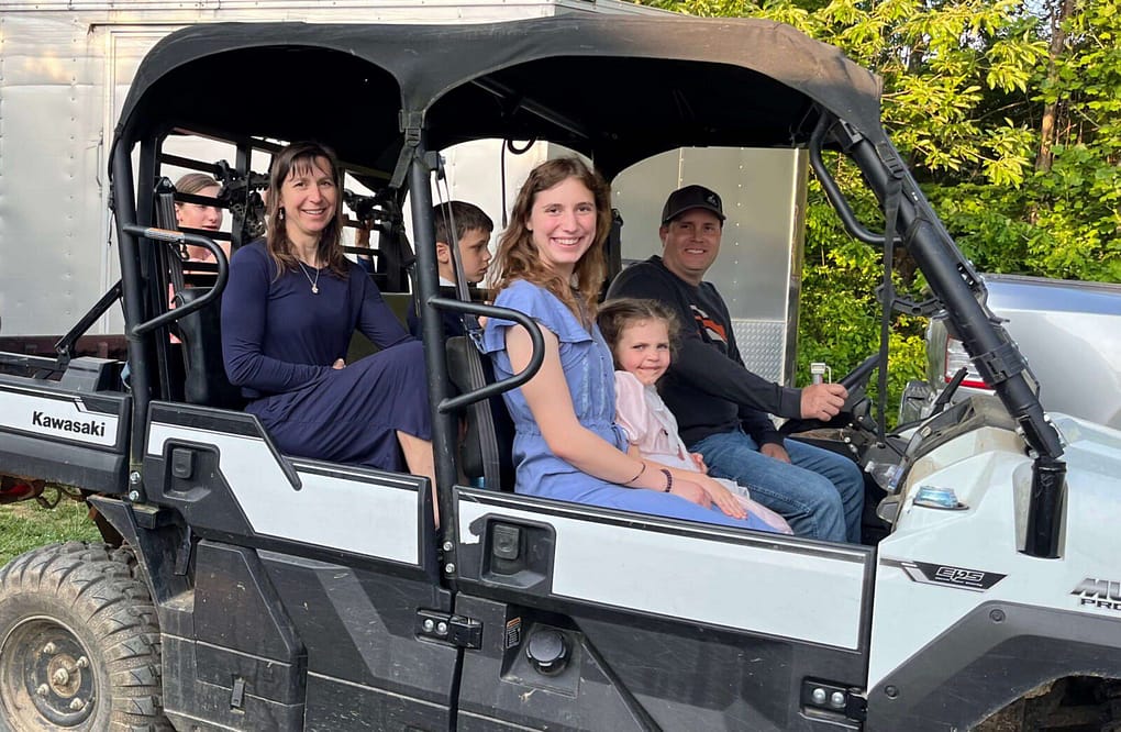 kids riding in a Mule 4 wheeler