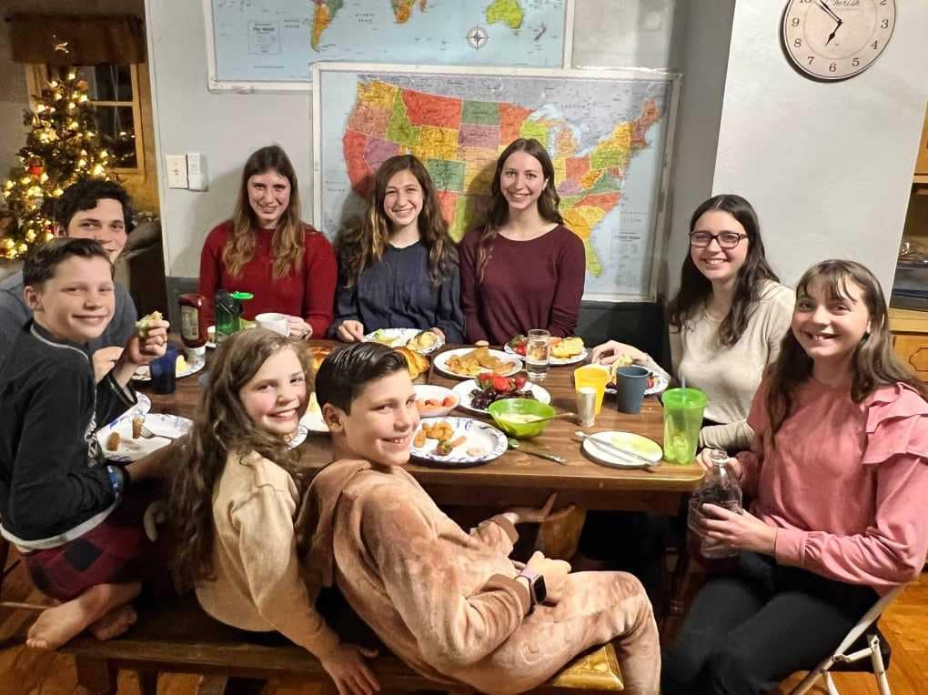 family eating Christmas Eve dinner