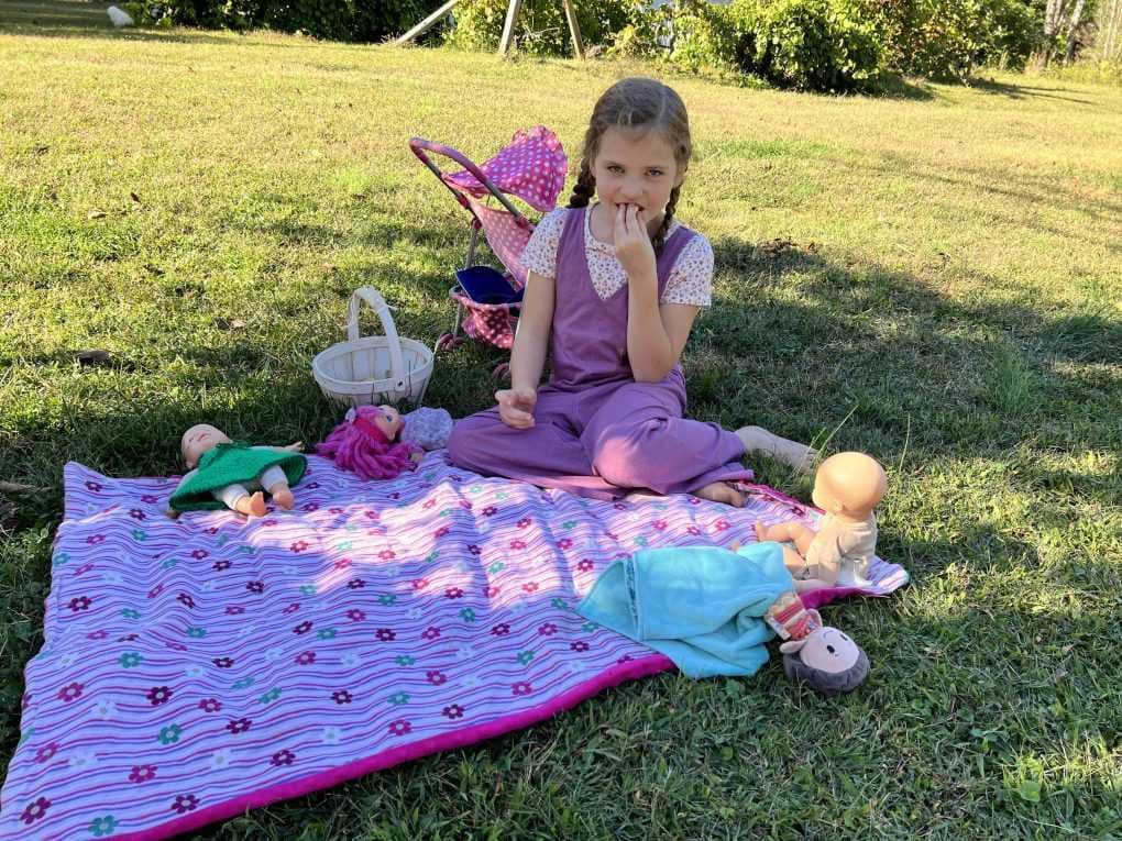 8 year old having a doll picnic