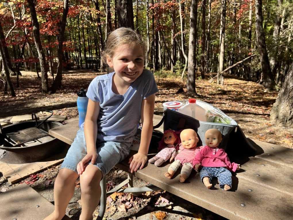 8 year old camping with dolls