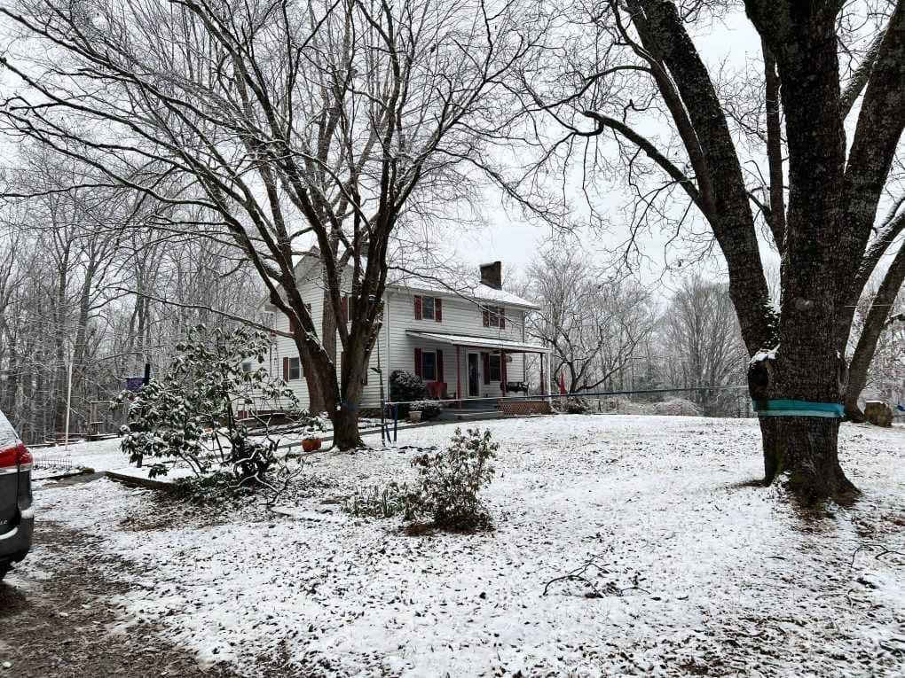 farmhouse in the snow