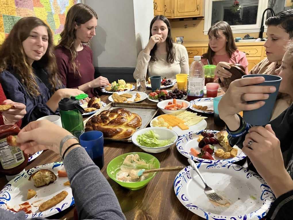 family eating Christmas Eve dinner