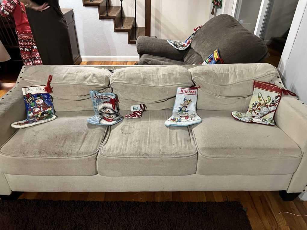 4 stockings on a couch