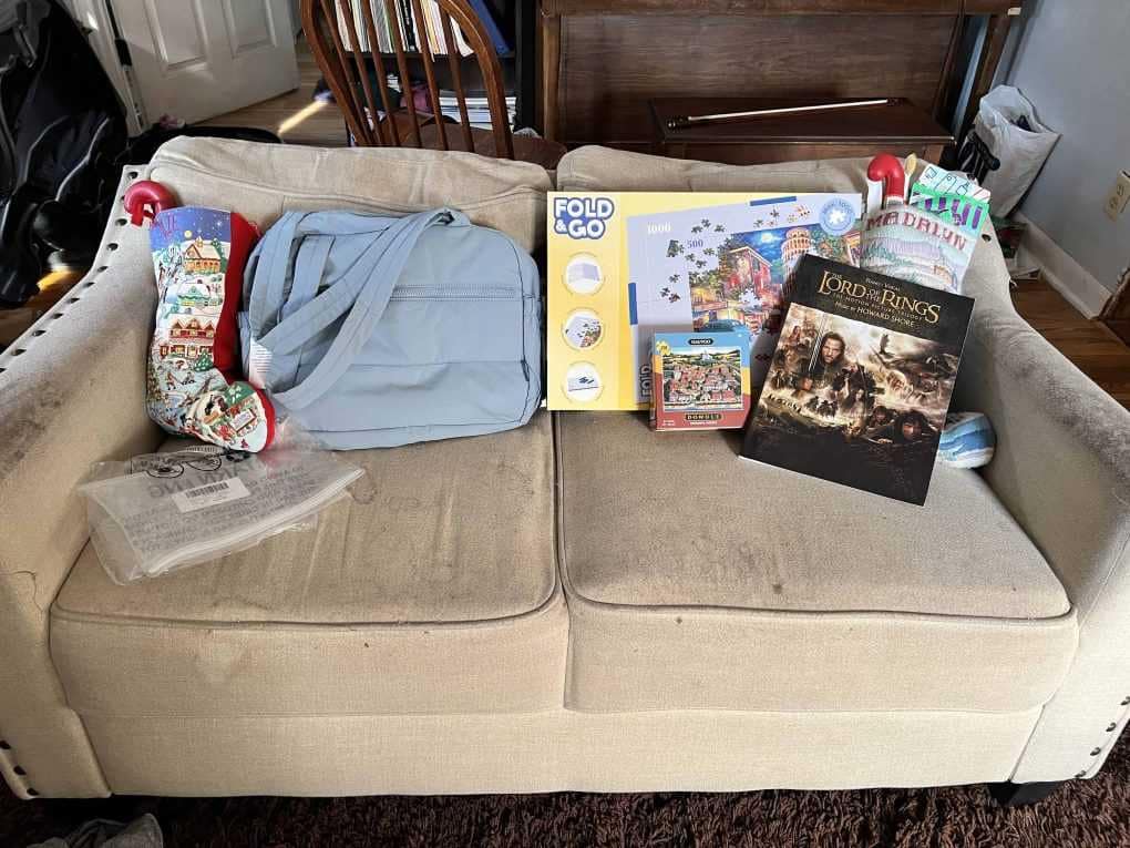 couch with stockings and presents on it