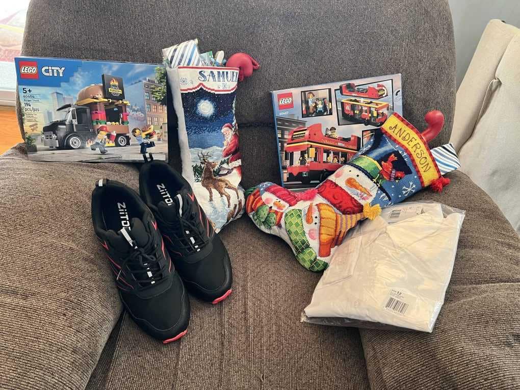 couch with stockings and presents on it