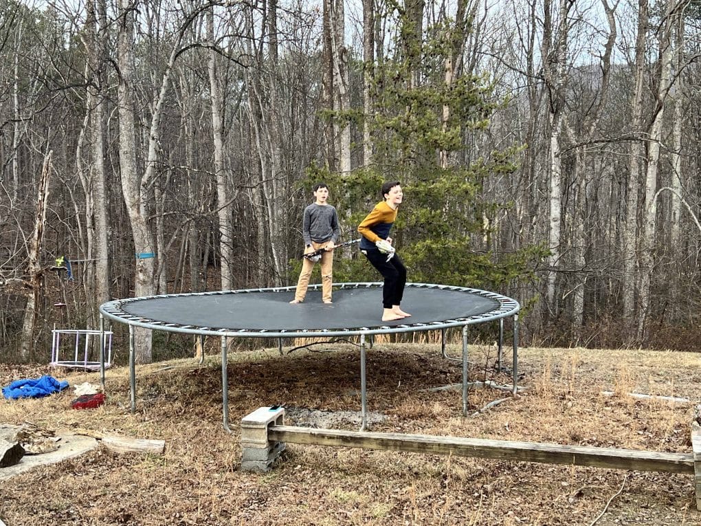 2 boys on a trampoline