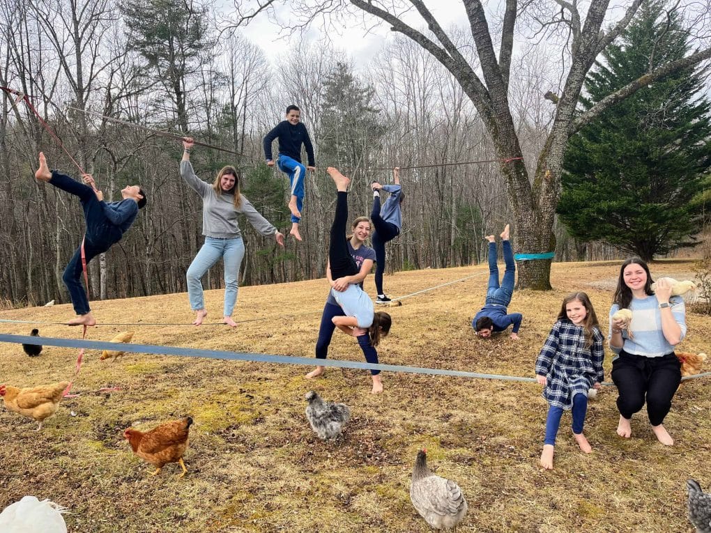 9 kids on a slack line