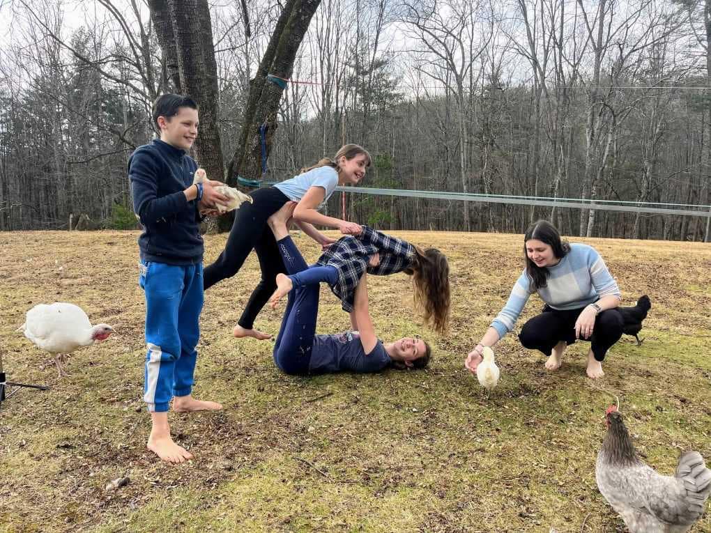 kids doing poses outside