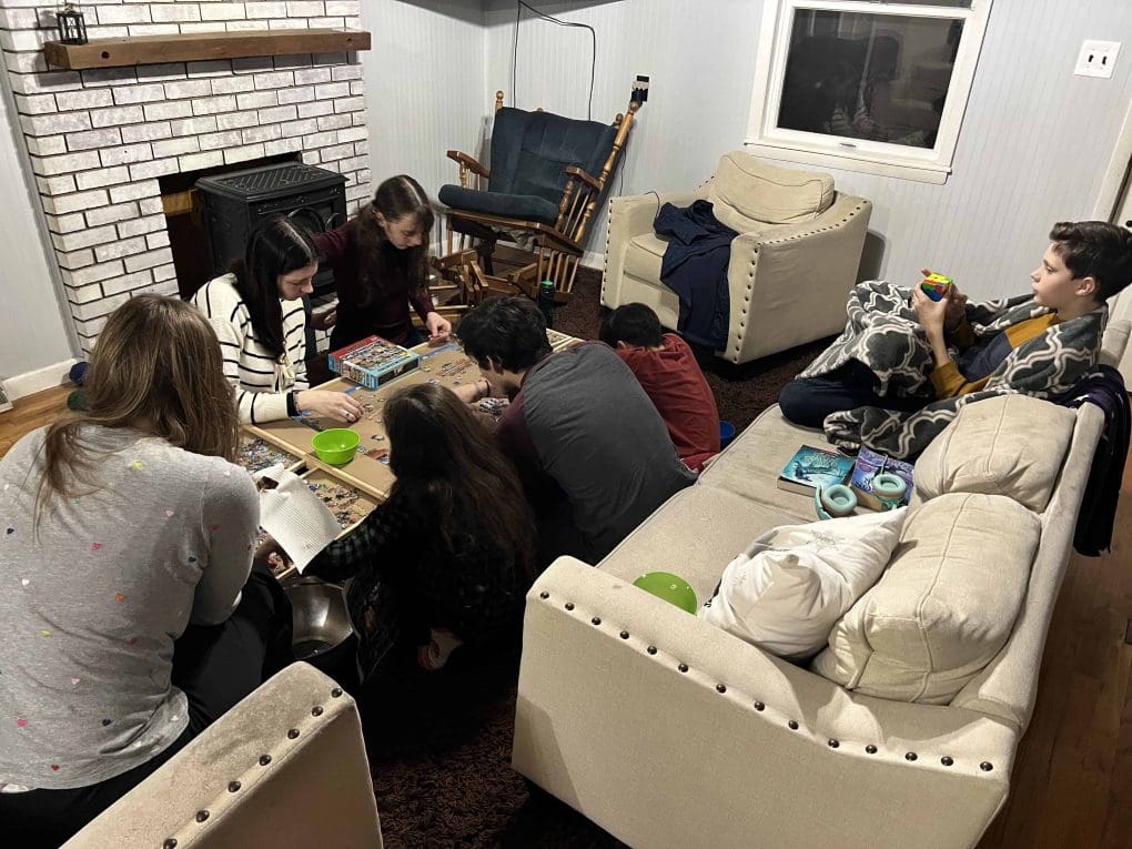 siblings doing a puzzle