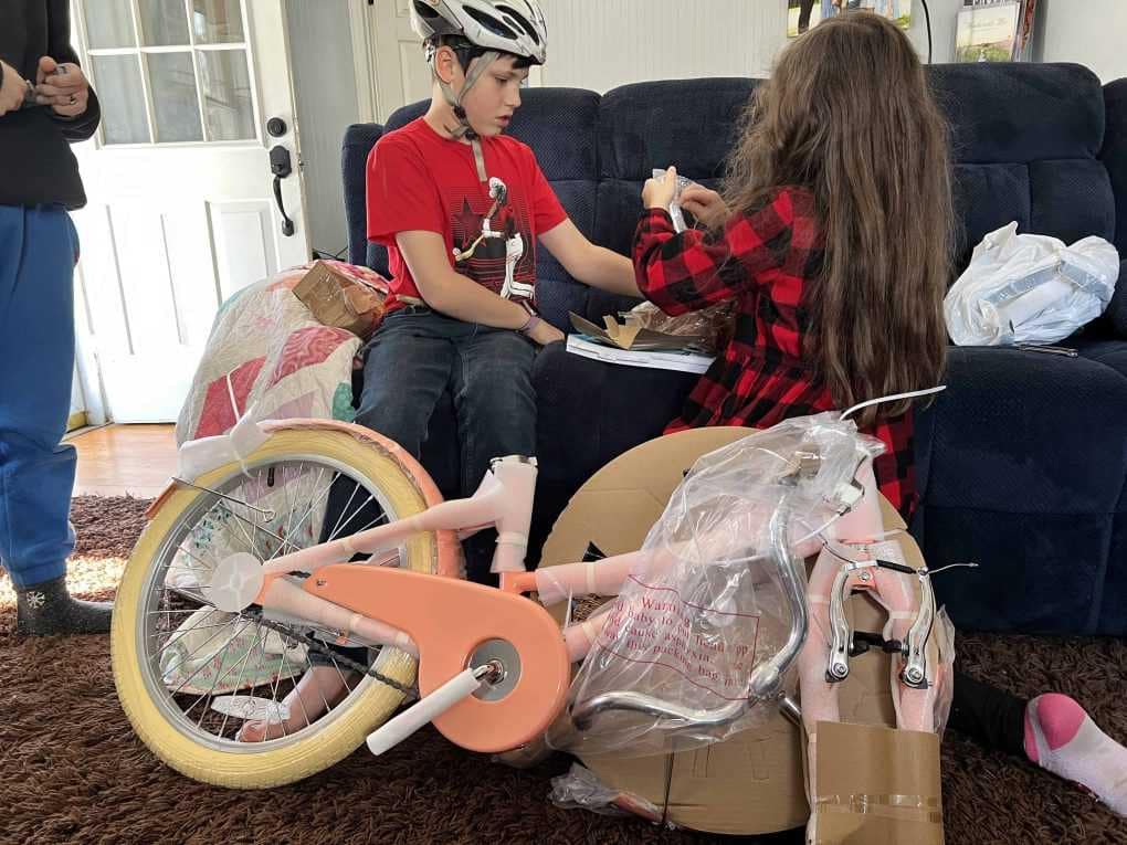 kids put together new bike