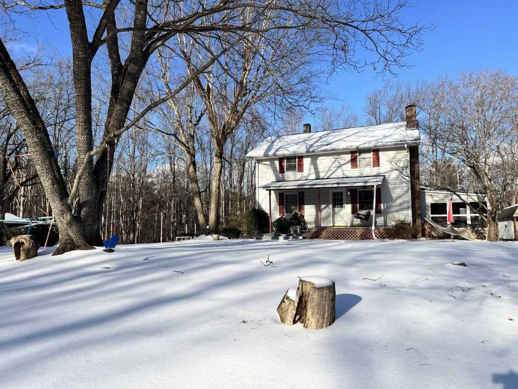 farmhouse yard encased in ice