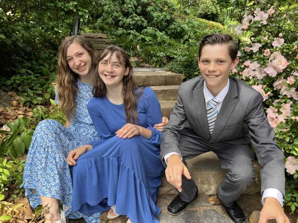 3 teens at Duke Gardens in church clothes