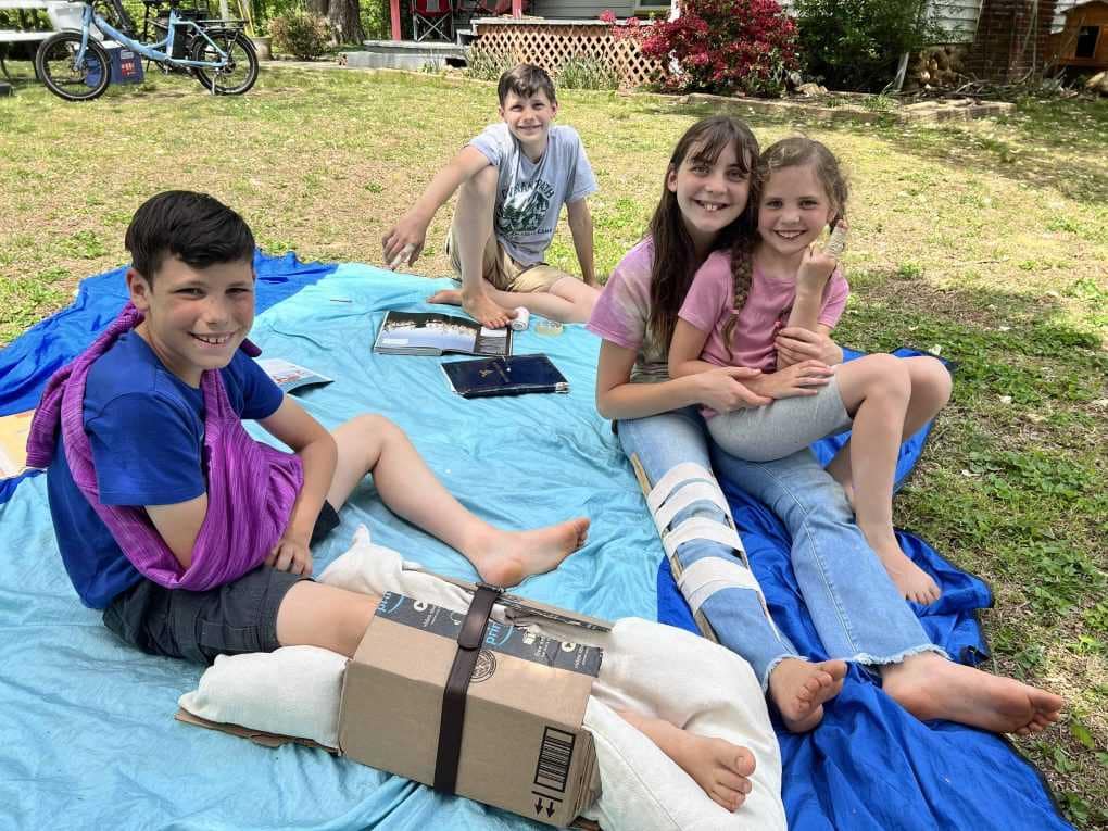 kids doing first aid class outside