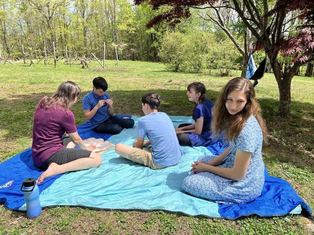 kids doing school outside