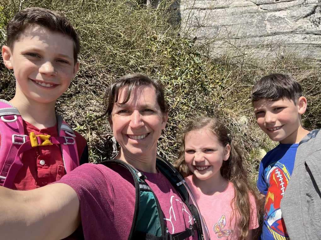 mom and 3 kids hiking at Pilot Mountain