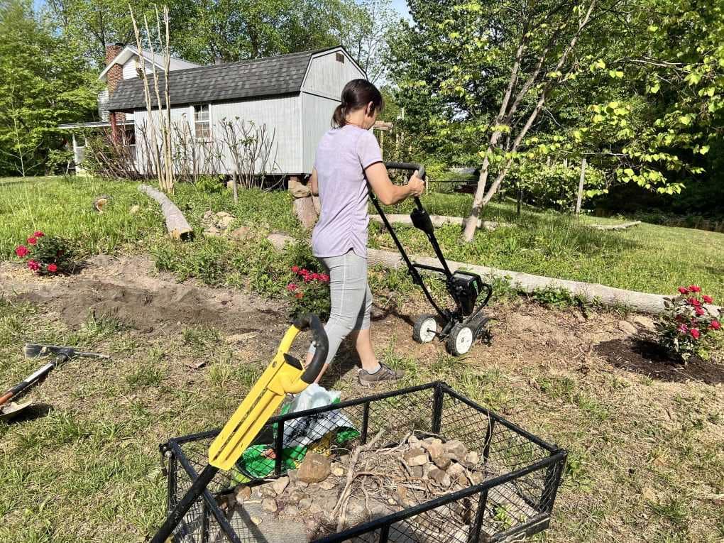 woman rototilling