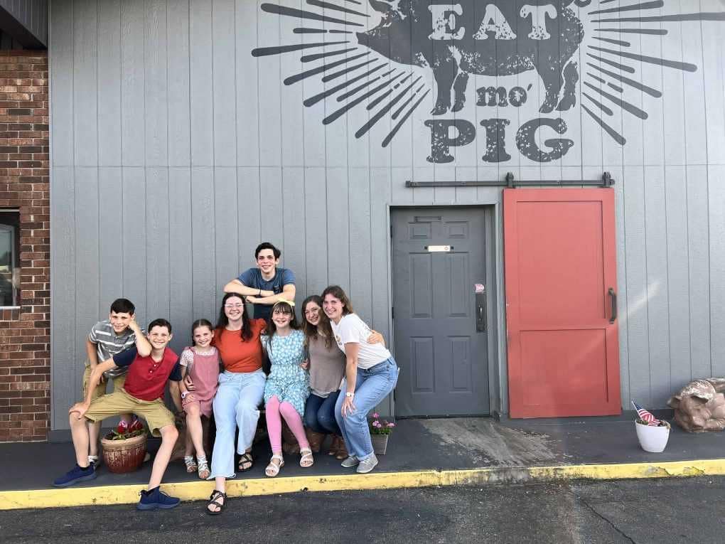 family outside restaurant