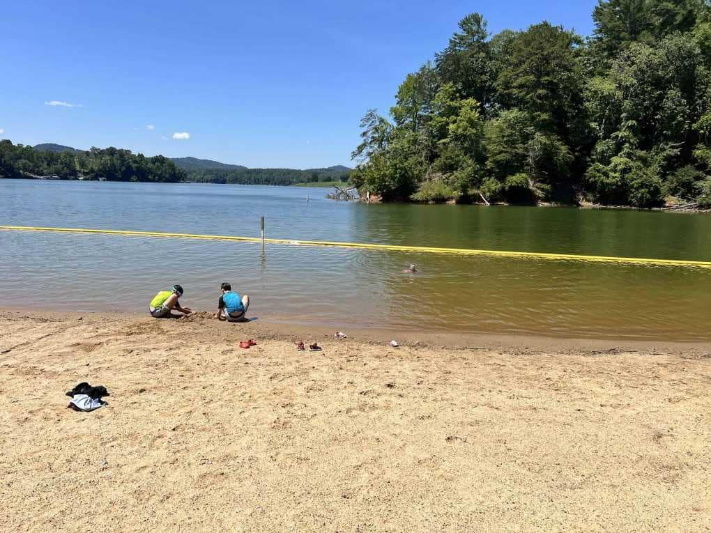 kids at a lake beach
