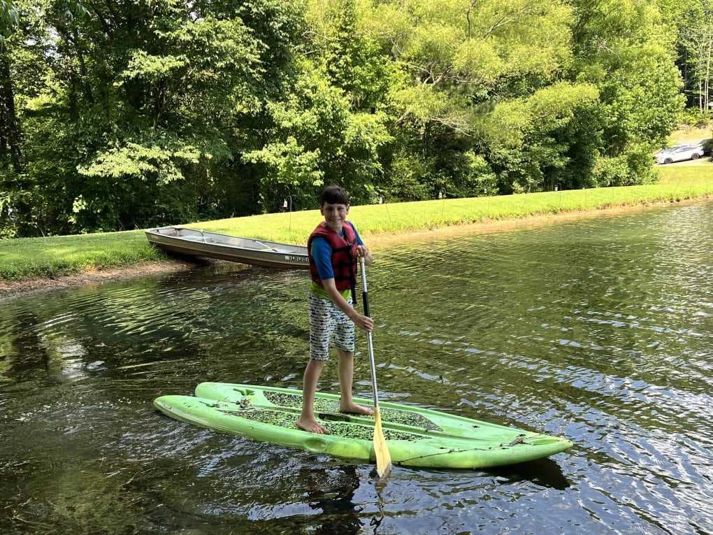 boy on paddle board
