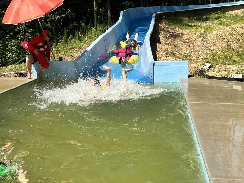 kids going down a waterslide