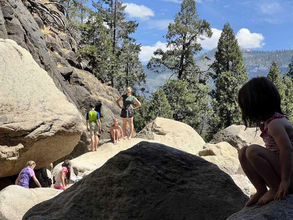 kids playing on rocks in Yosemite