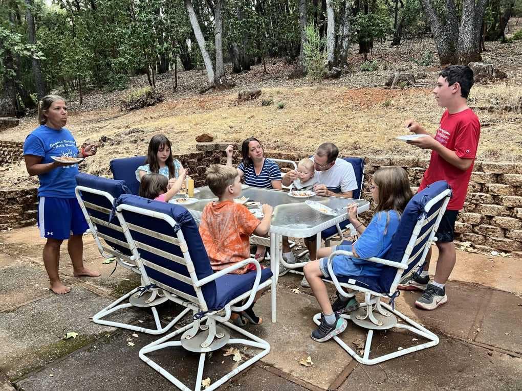 family eating on the patio