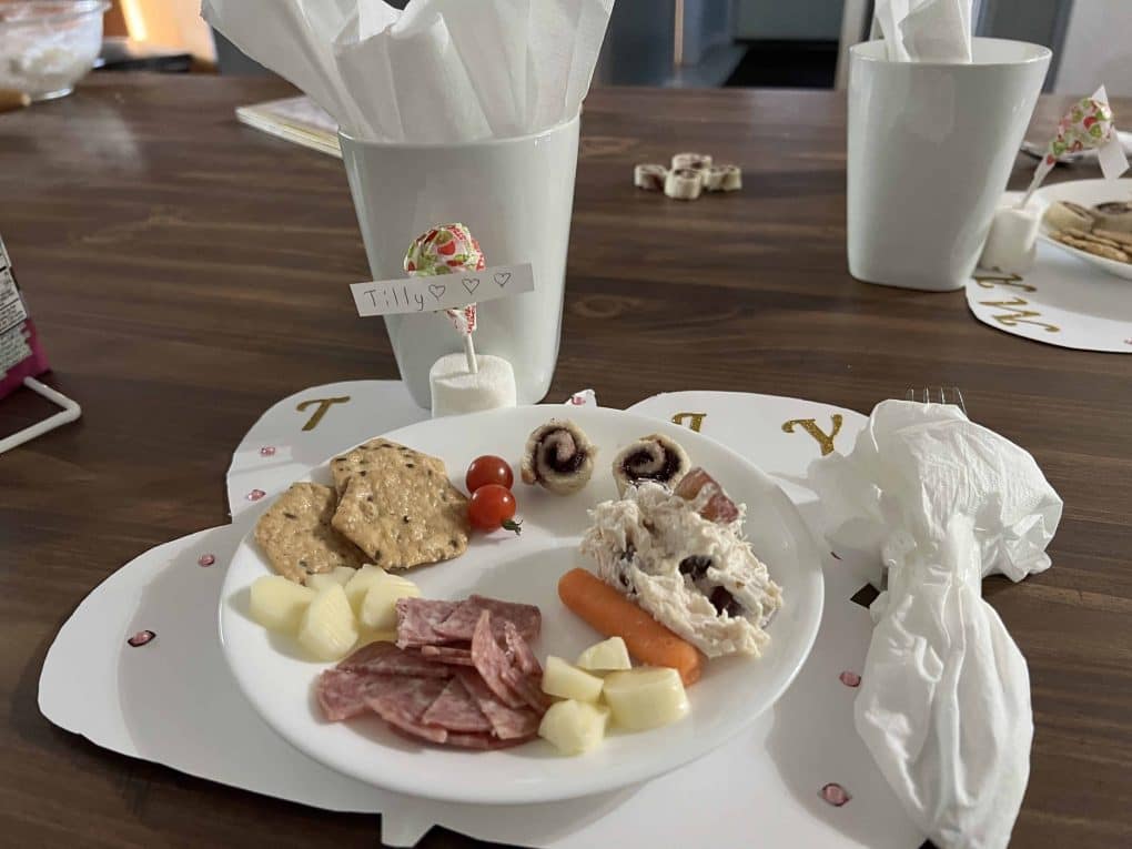 plate with tea party food on it