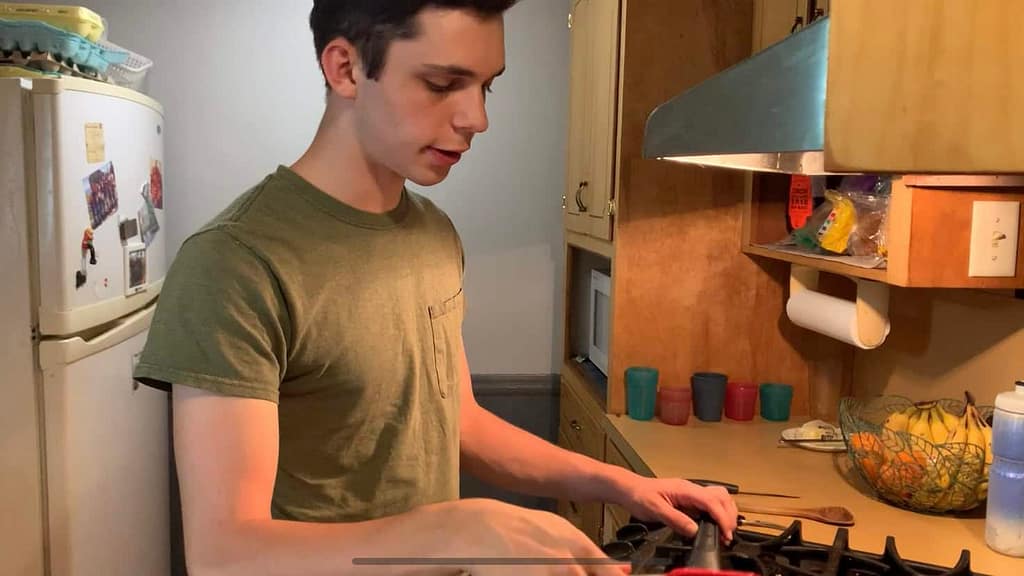 16 year old boy making fajitas