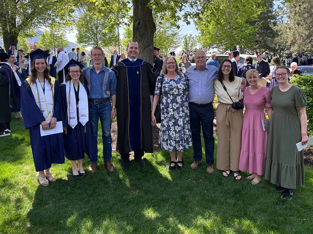 BYU graduates with family