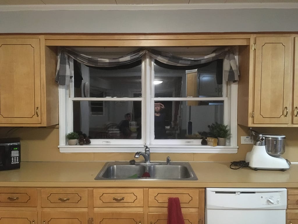 kitchen window trim painted white with a swag curtain valance blue gray buffalo check