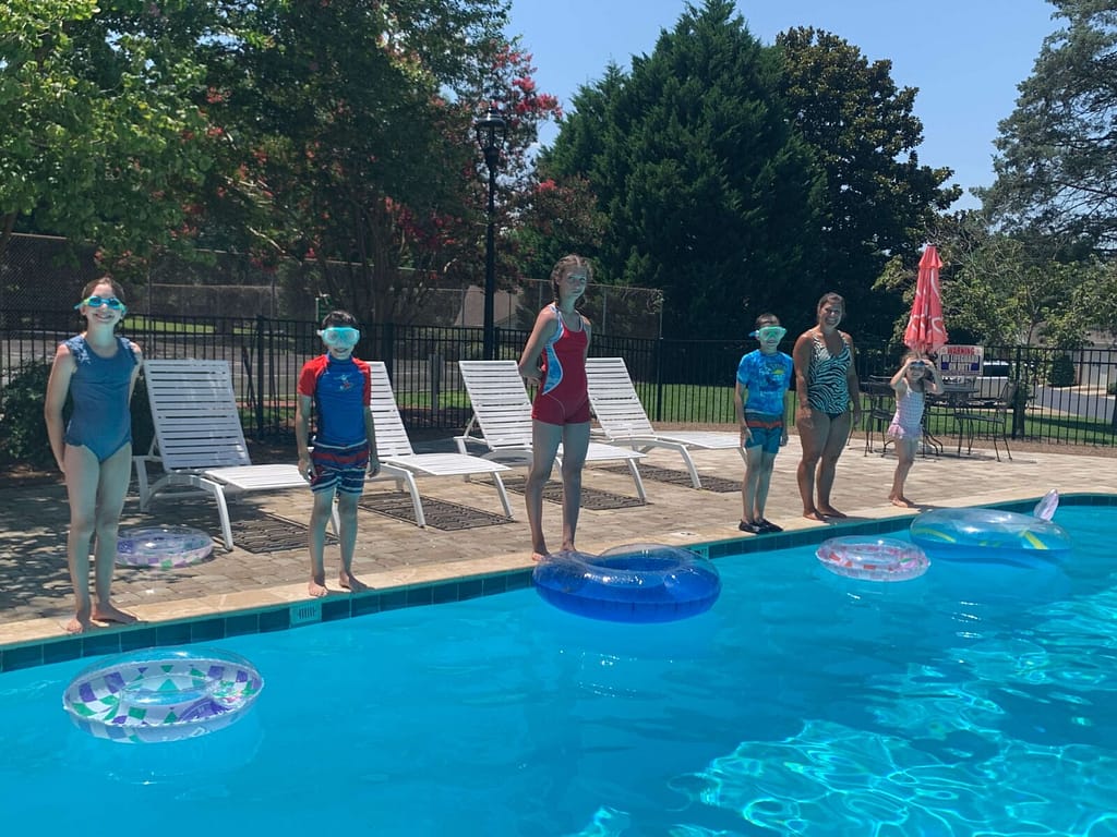 5 siblings ready to jump into the pool