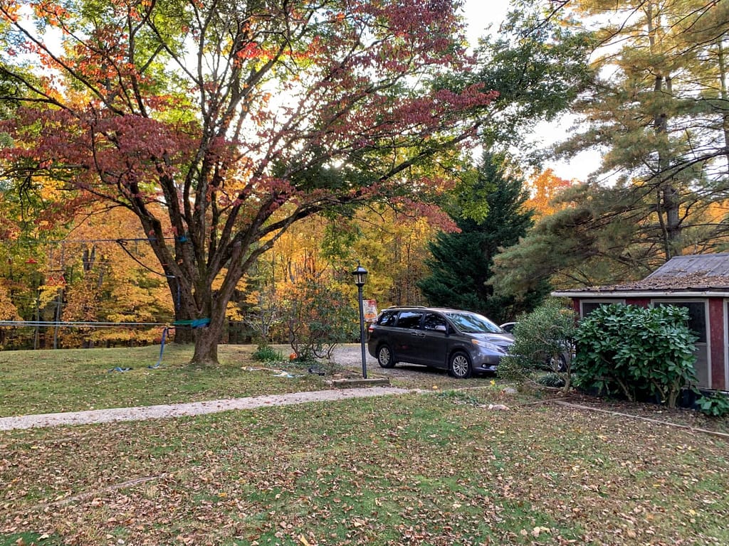 yard in the country with beautiful fall foliage