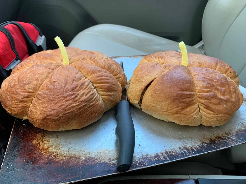 two loaves of pumpkin shaped bread