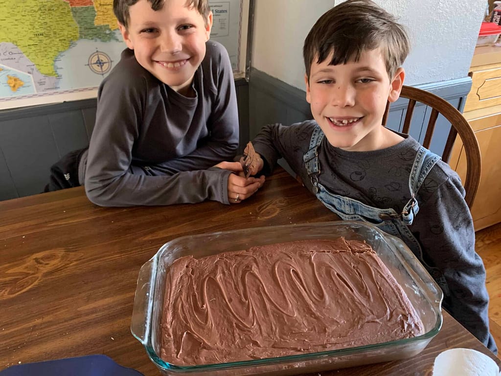 2 boys with a pan of fudge