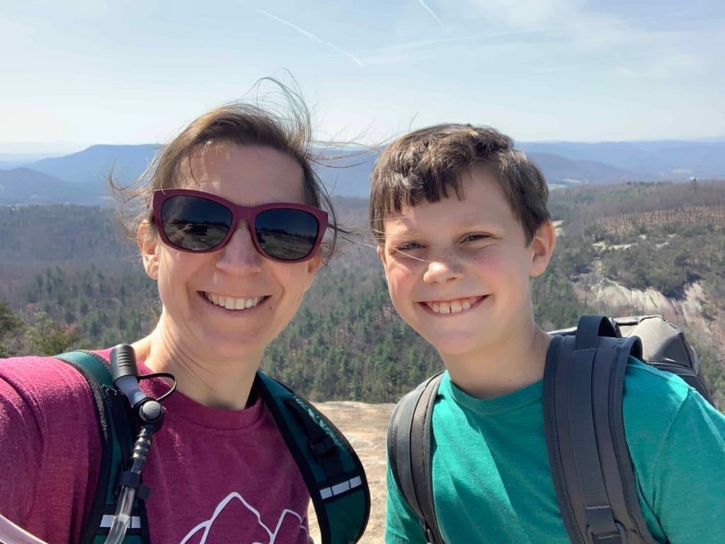 mom and son on top of Stone Mountain