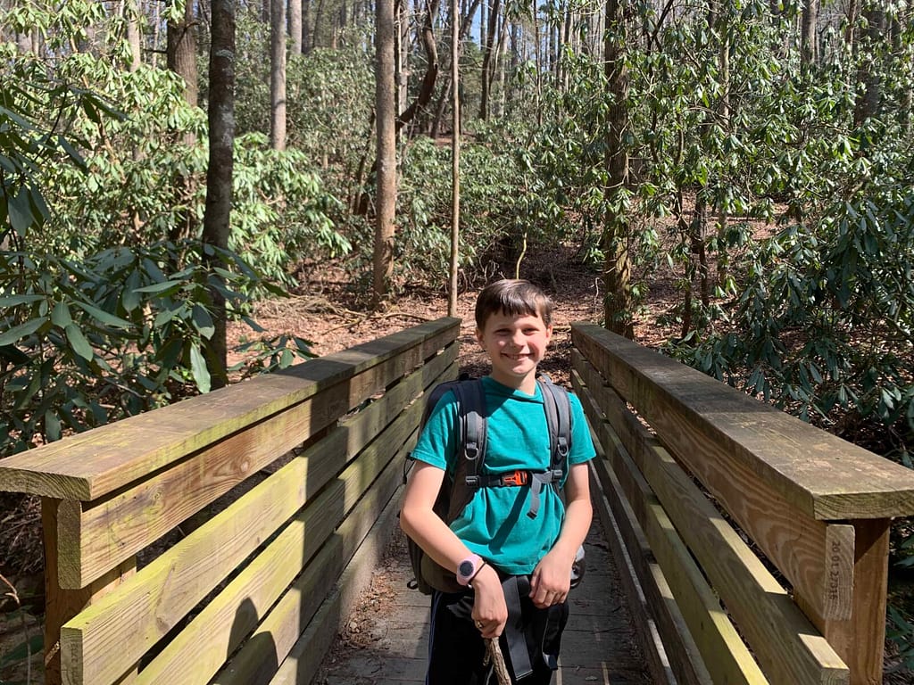10 year old boy hiking at Stone Mountain