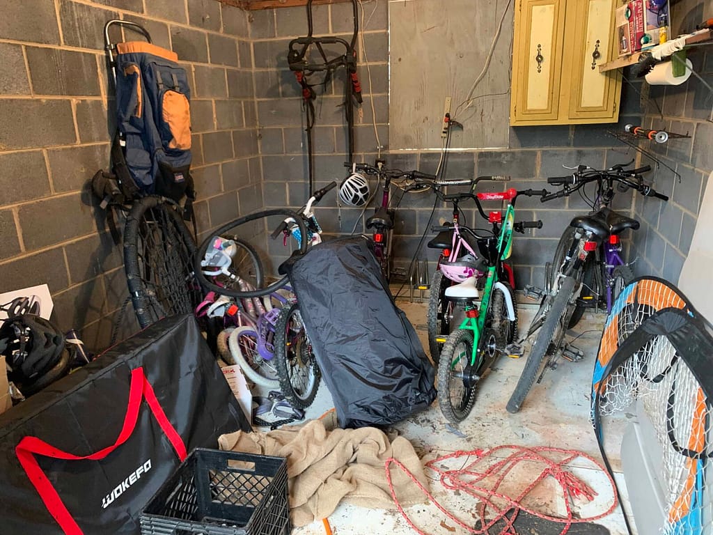 inside of a messy bike shed