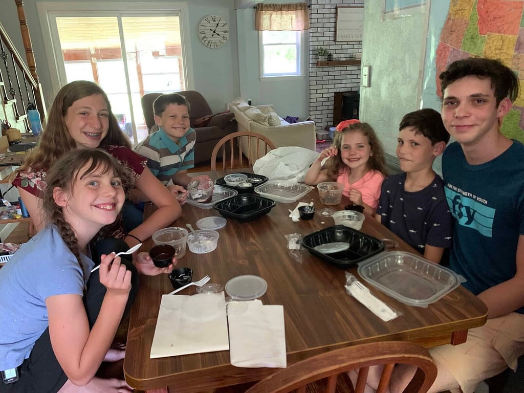 kids eating brownie sundaes at the table