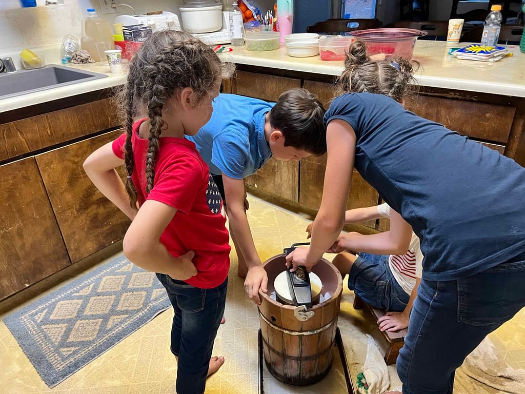 cranking homemade ice cream
