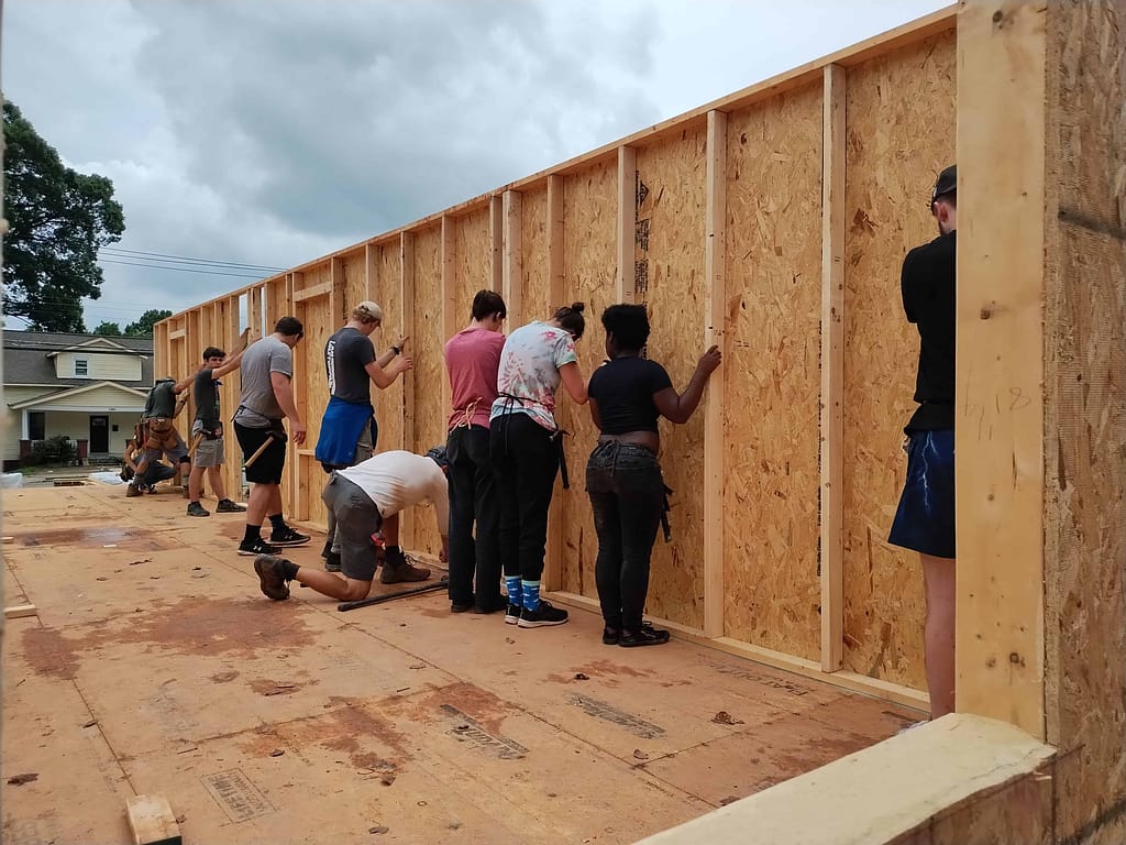 youth doing a habitat for humanity build