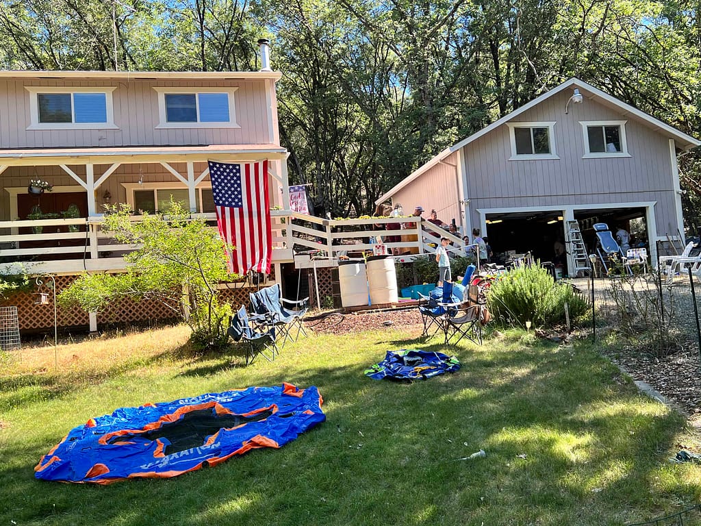 yard sale in front of a big country house