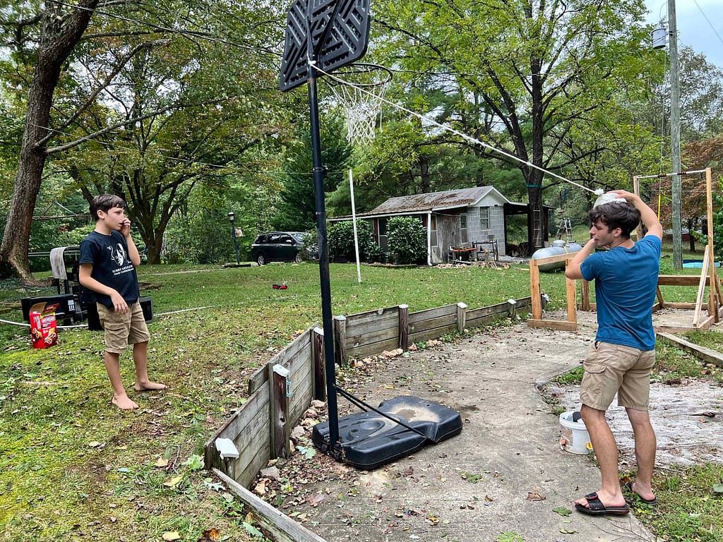 two boys playing tetherball