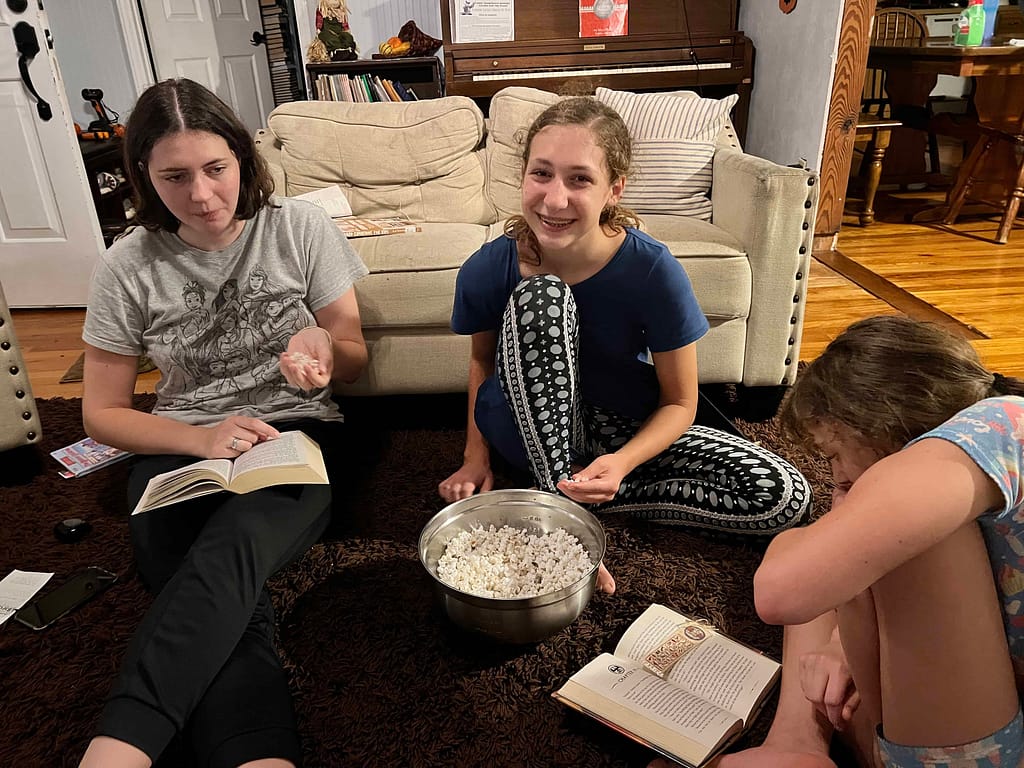 girls reading and eating popcorn