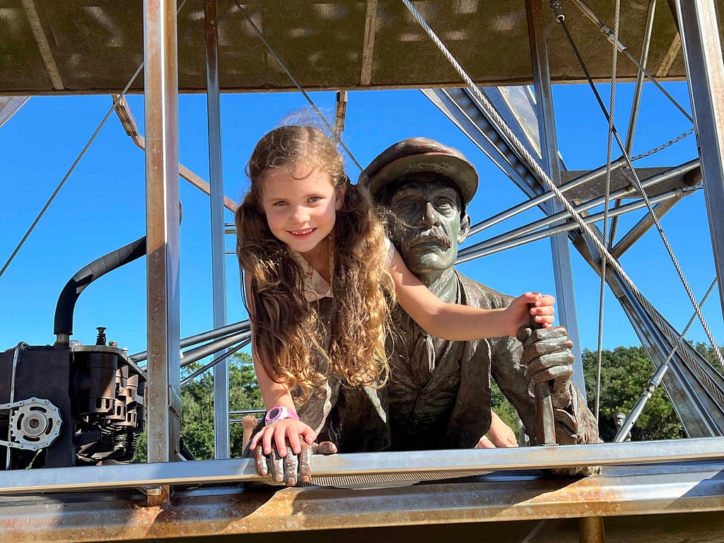 girl on Wright flyer