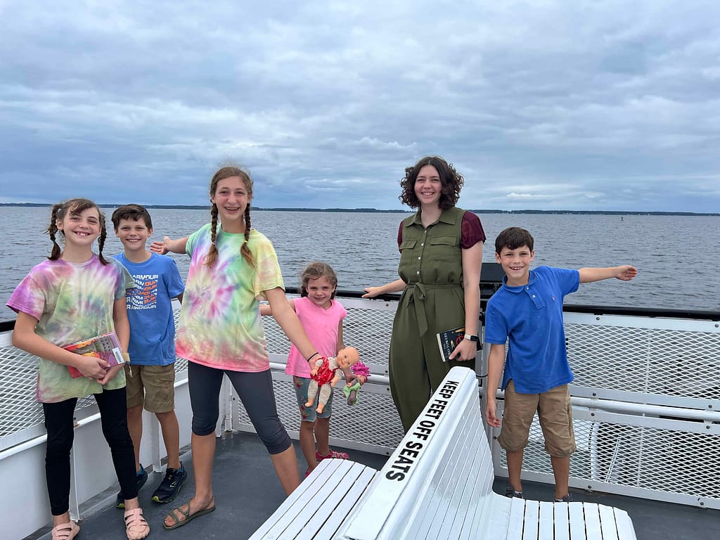 siblings riding on the car ferry in Aurora, NC