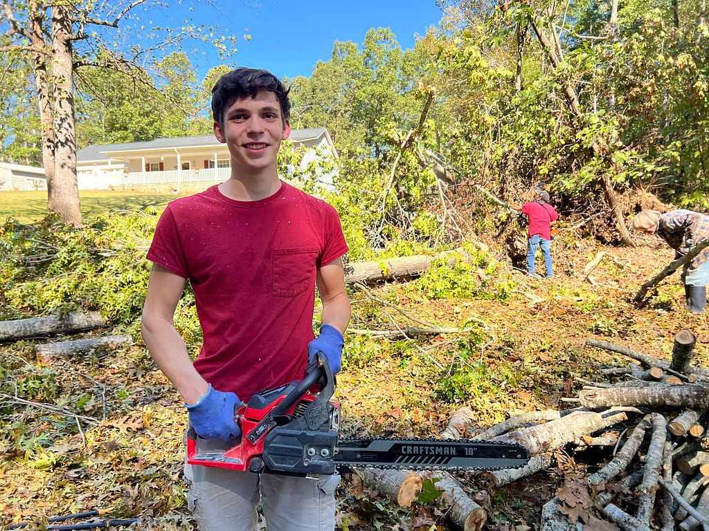 17 year old boy with a chainsaw