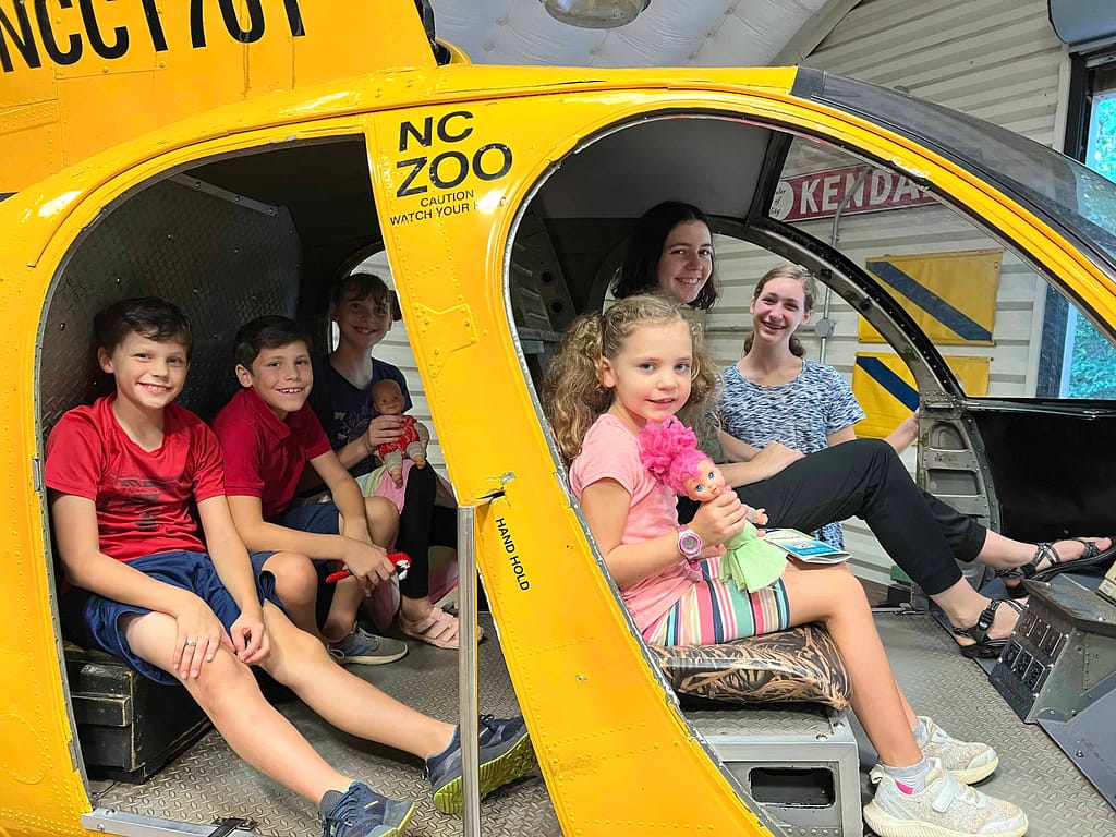 kids in helicopter at NC zoo