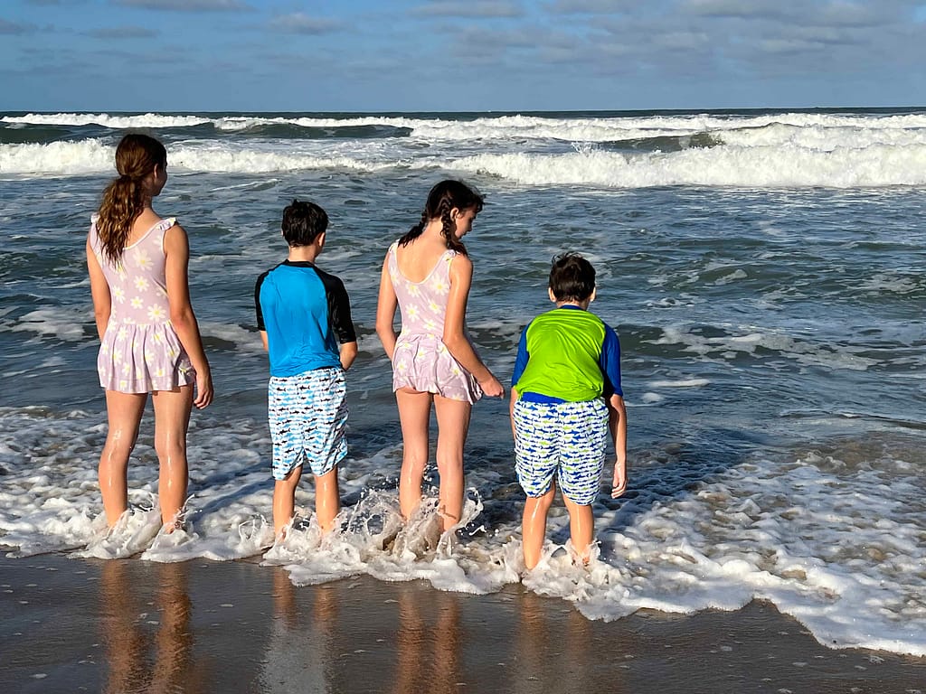 4 kids at the beach